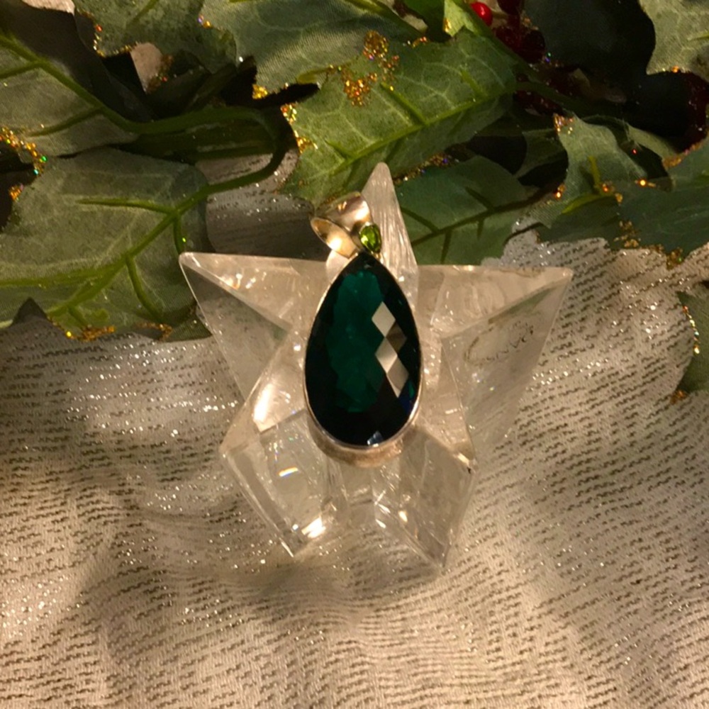 Green chrome diopside glass makes this beautiful teardrop pendant a must have!